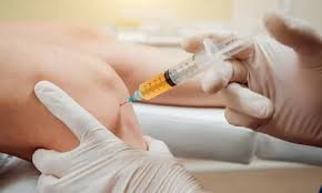 Medical professional preparing PRP injection